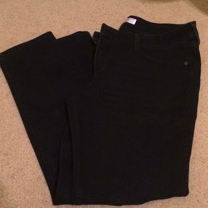 Black skinny jeans with ripped knees